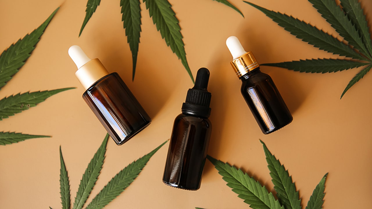 CBD oil and hemp leaves